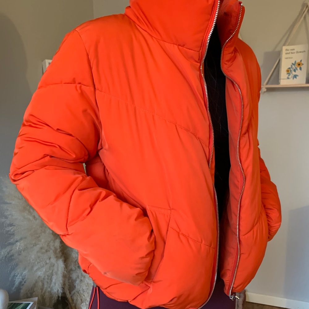 Oranger puffer coat
